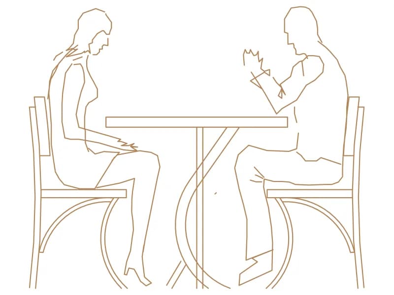 CAD block of a couple seated at a round café table with bentwood chairs